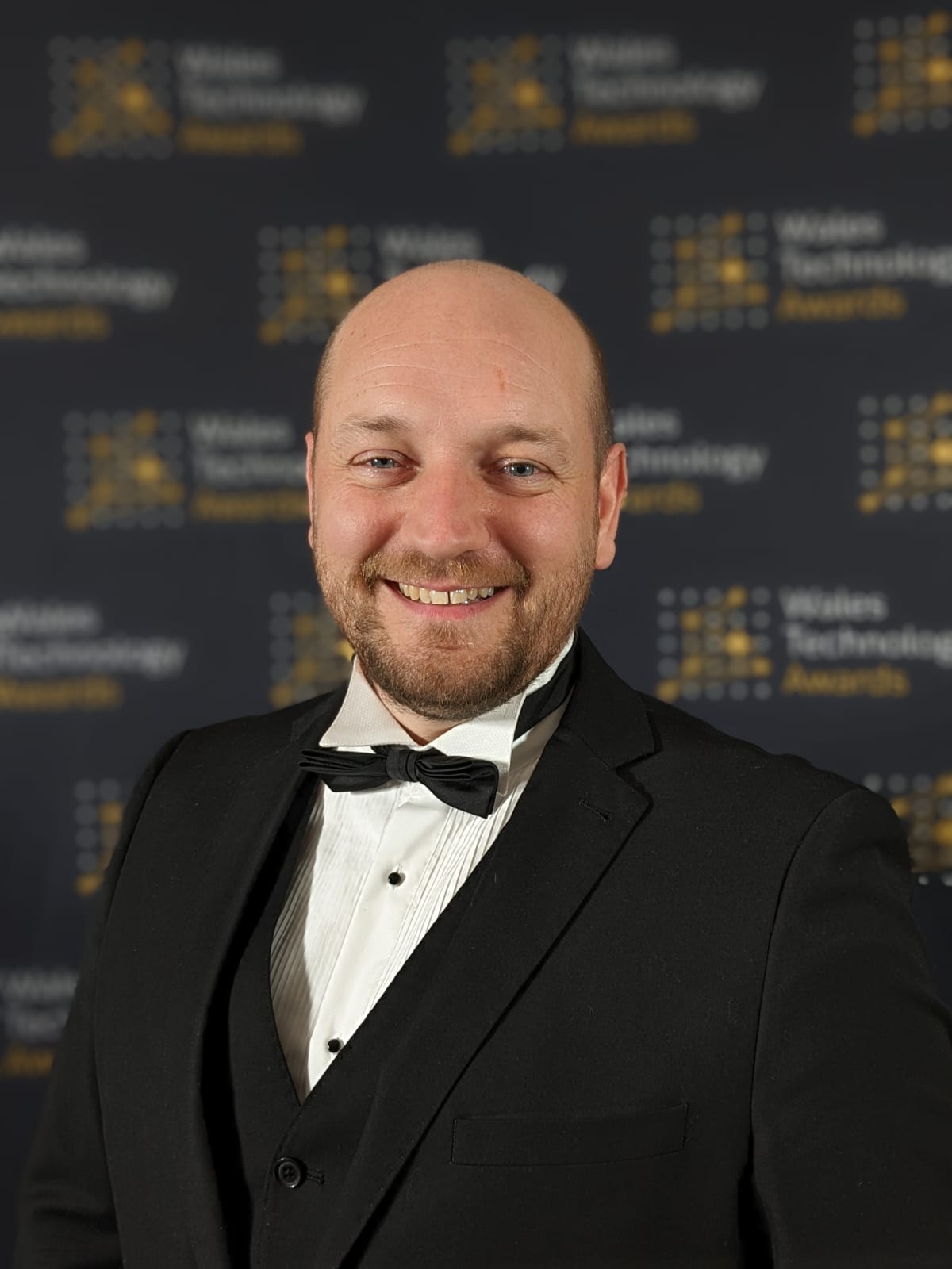 Headshot of Nick in Black Tie, attending the Wales Technology Awards