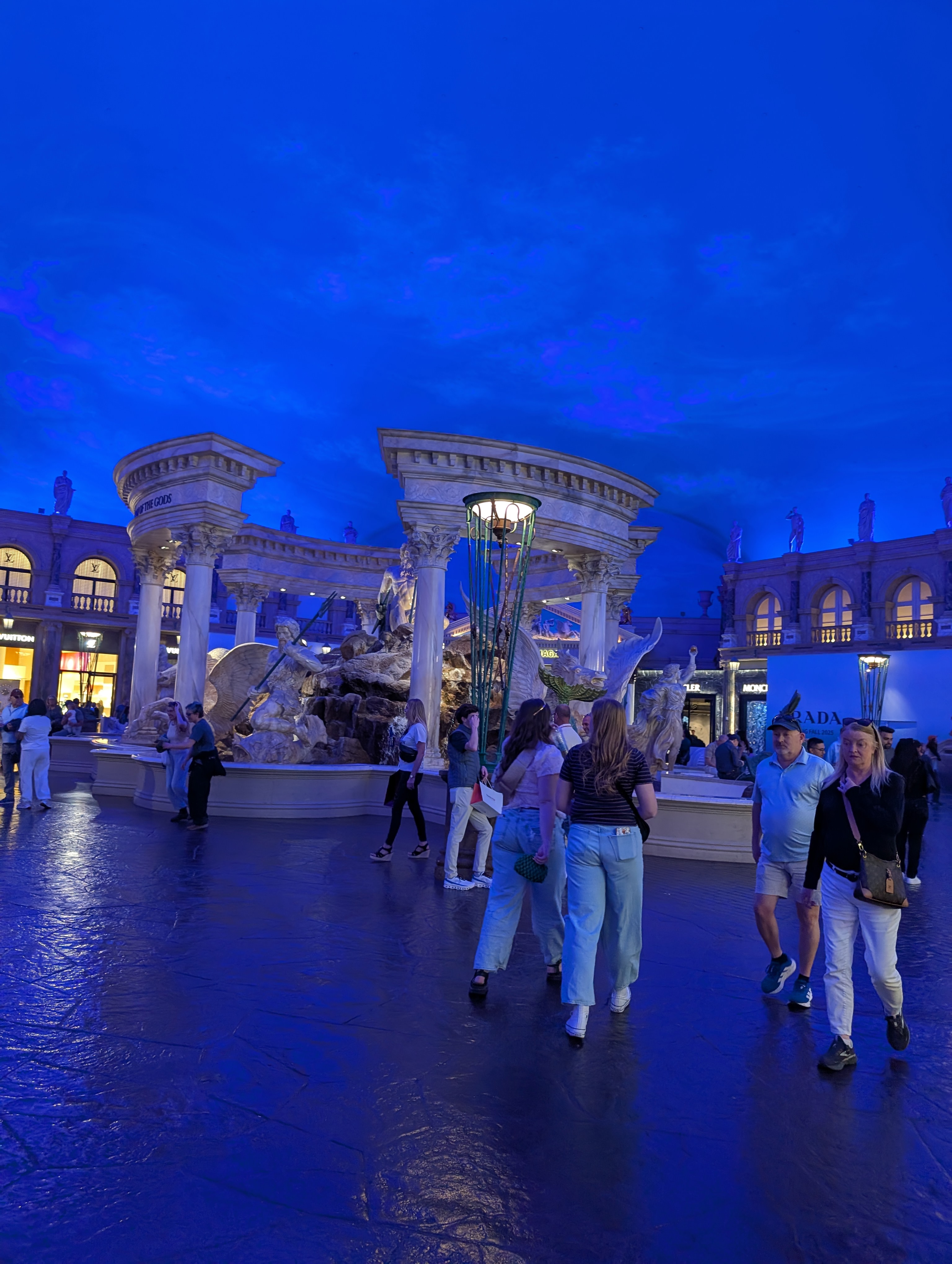 Fountain of the Gods, Caesars Palace mall, Las Vegas at twilight, in the middle of the day.
