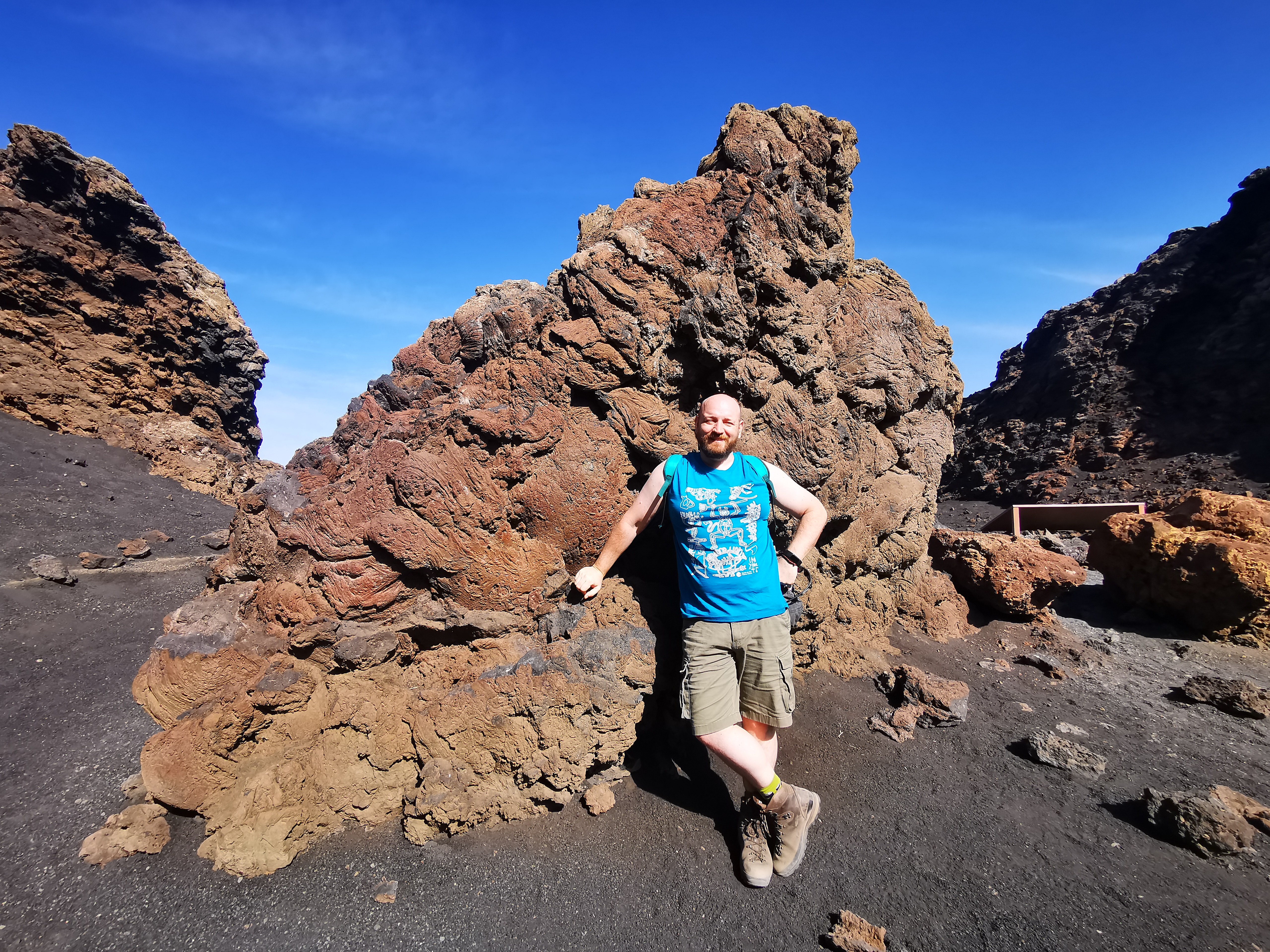 Nick poses by some 300 year old Lava at the mouth of Volcán El Cuervo in Lanzarote